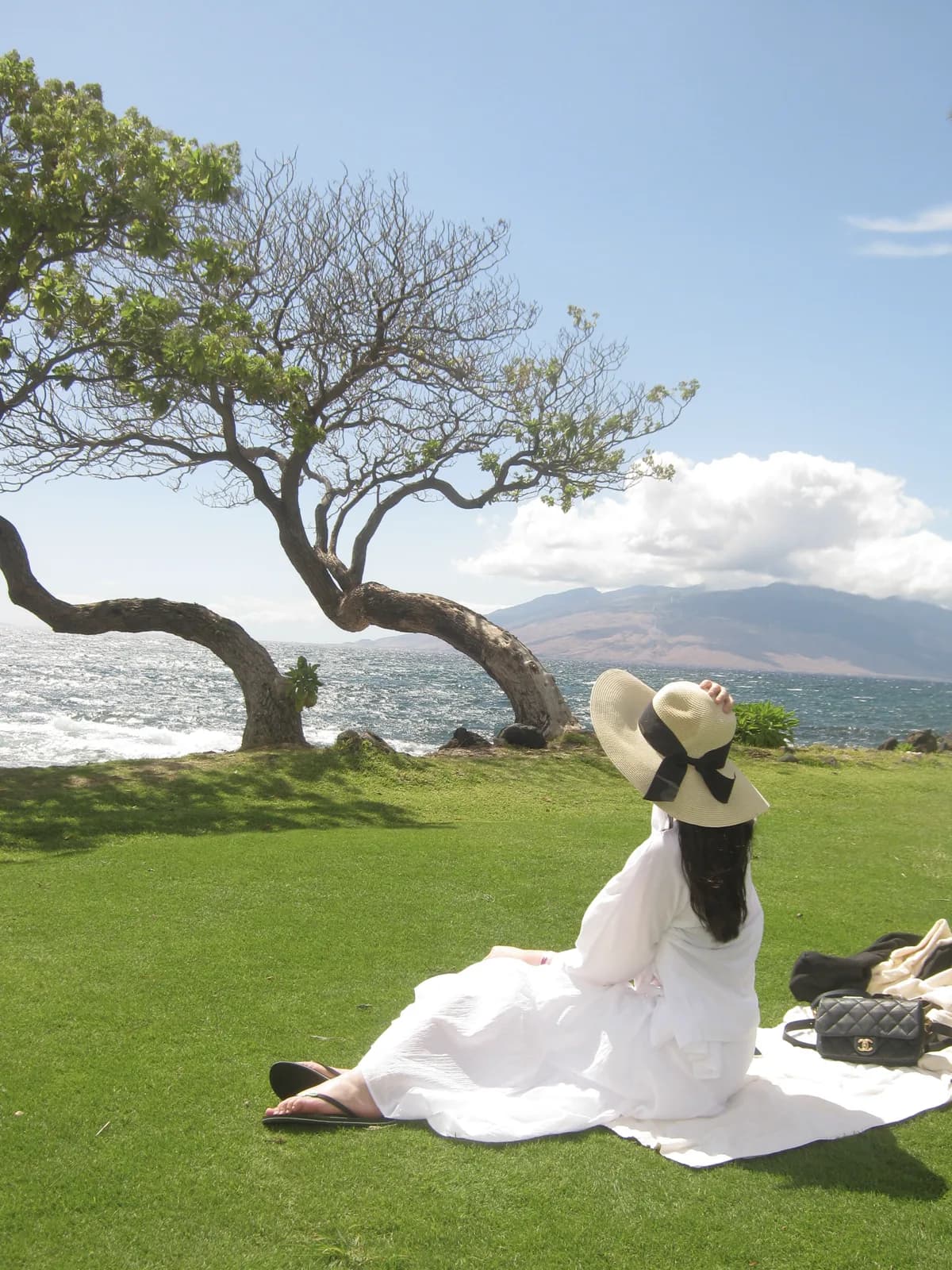 Ashley relaxing by the ocean in Hawaii